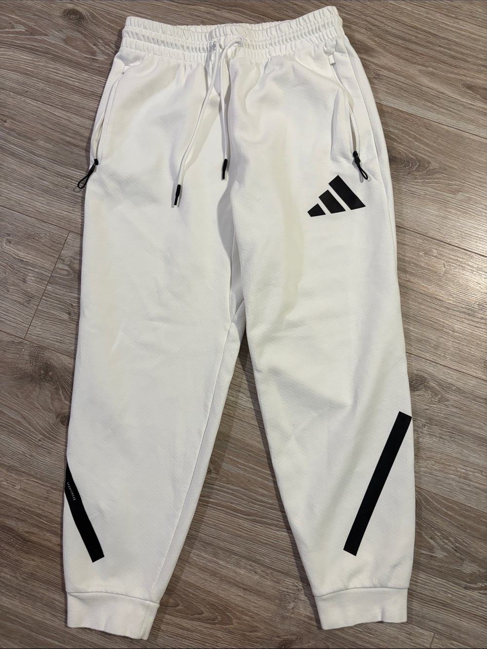 Cream White Adidas Men's Performance Joggers with Black Accents